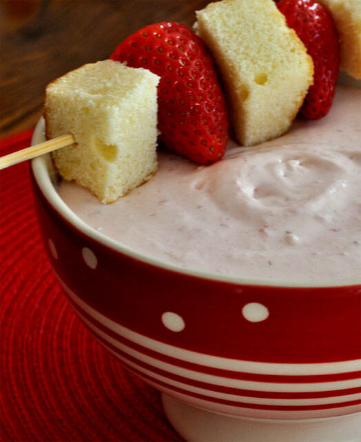 Strawberry shortcake turned into a dip! Served with strawberries and pound cake, this strawberry shortcake dip is a perfect summer treat.