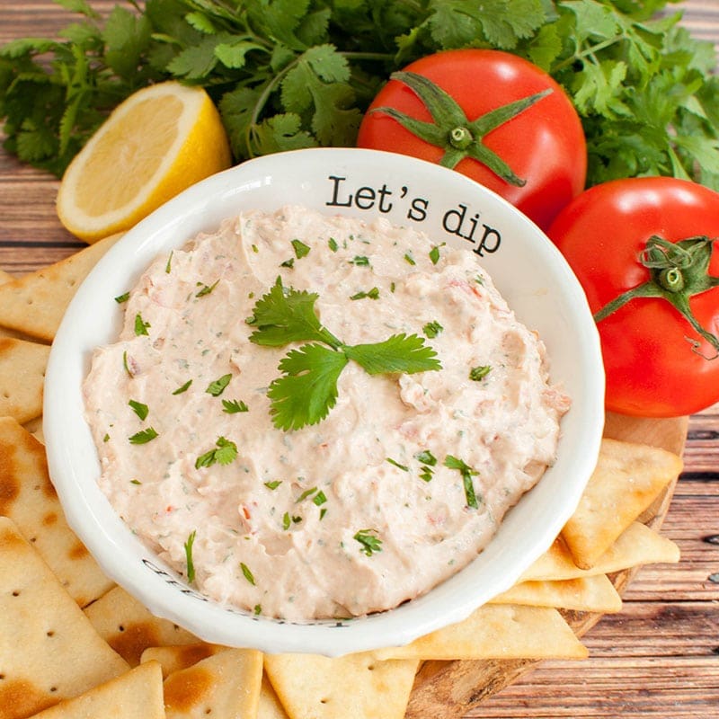 white bowl filled with texas love dip that reads let's dip