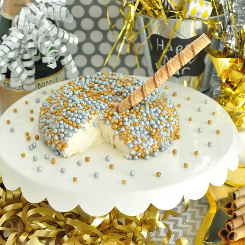 Champagne Cheesecake Cheese Ball- Ring in the new year with this festive and easy dessert dip recipe. Great for your New Year's Eve Party.