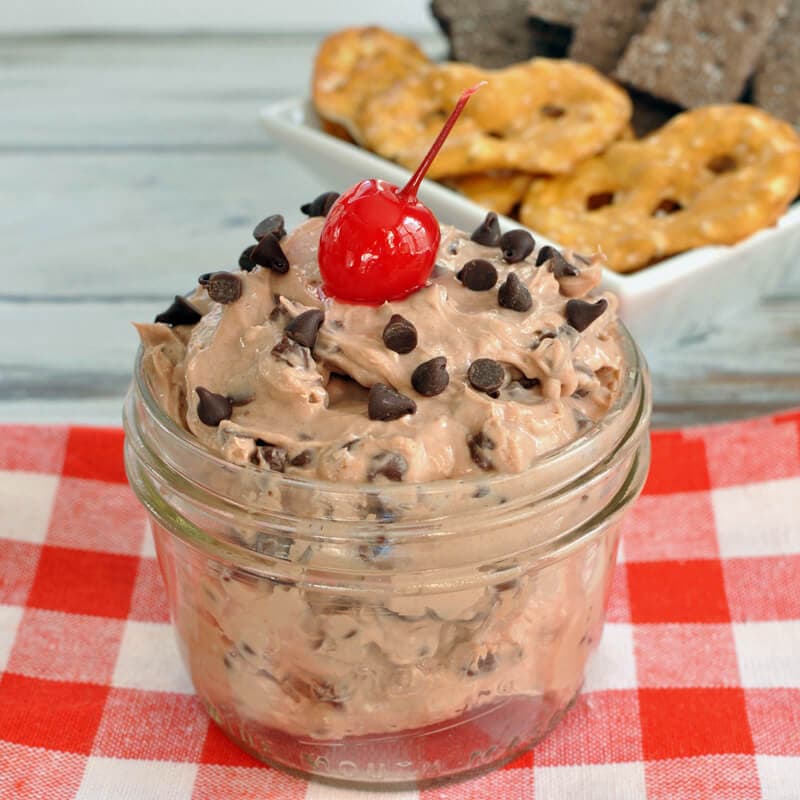 Easy, 5 ingredient fruit dip that tastes like a chocolate covered cherry. This chocolate cherry fruit dip is great for Valentine's Day or any dessert table. #madewithchobani