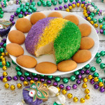 Festive King Cake Cheese Ball has the flavor and colors of a King Cake, but in an easy to make cheese ball. Great dessert to celebrate Mardi Gras!