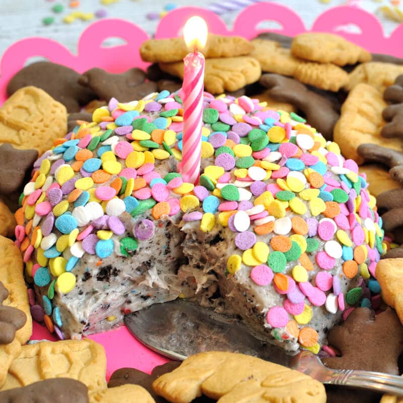 This Birthday Cake Oreo Cheese Ball is a great idea for a kid's birthday party! Made with Birthday Cake Oreos and served with animal crackers.