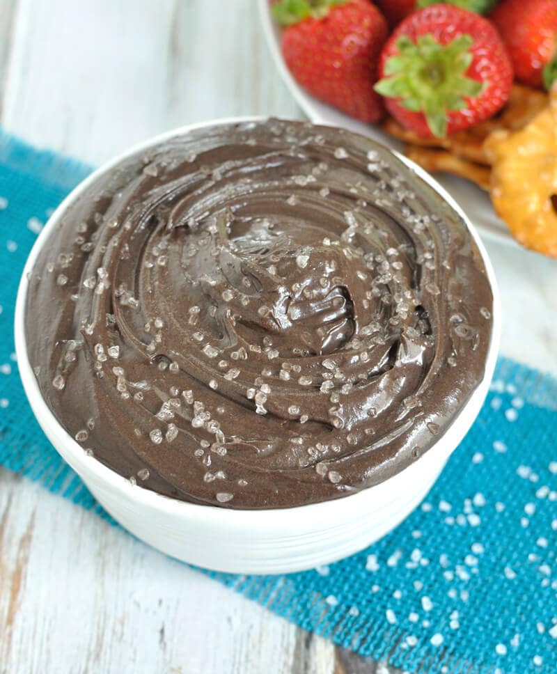 Easy 5 ingredient dark chocolate fruit dip recipe. A touch of sea salt brings out the richness of dark chocolate in this Dark Chocolate Sea Salt Fruit Dip.