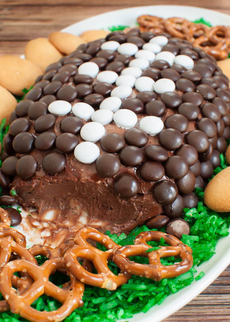 Chocolate dessert cheese ball football with the corner cut into