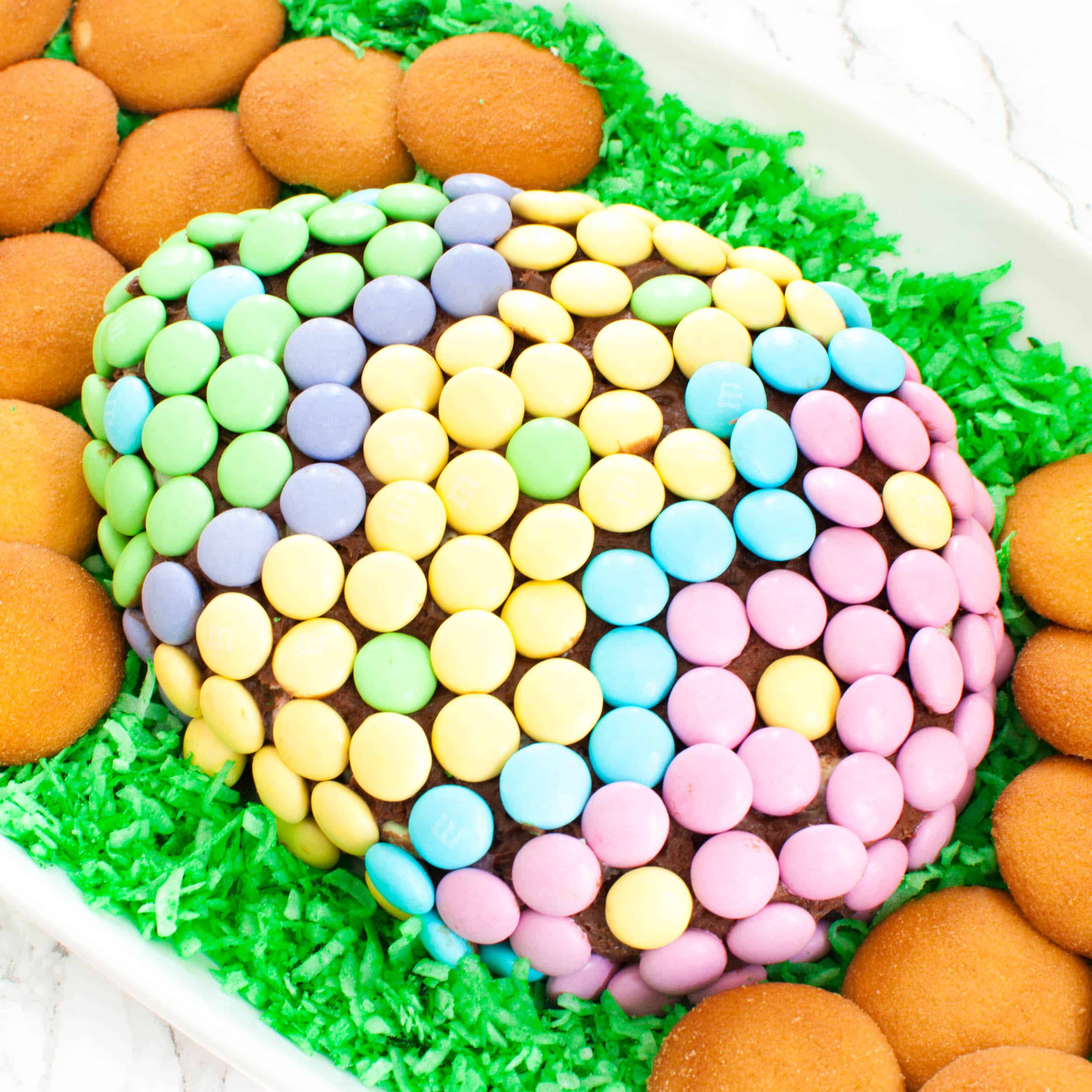 chocolate Easter cheese ball with M&Ms on edible Easter grass